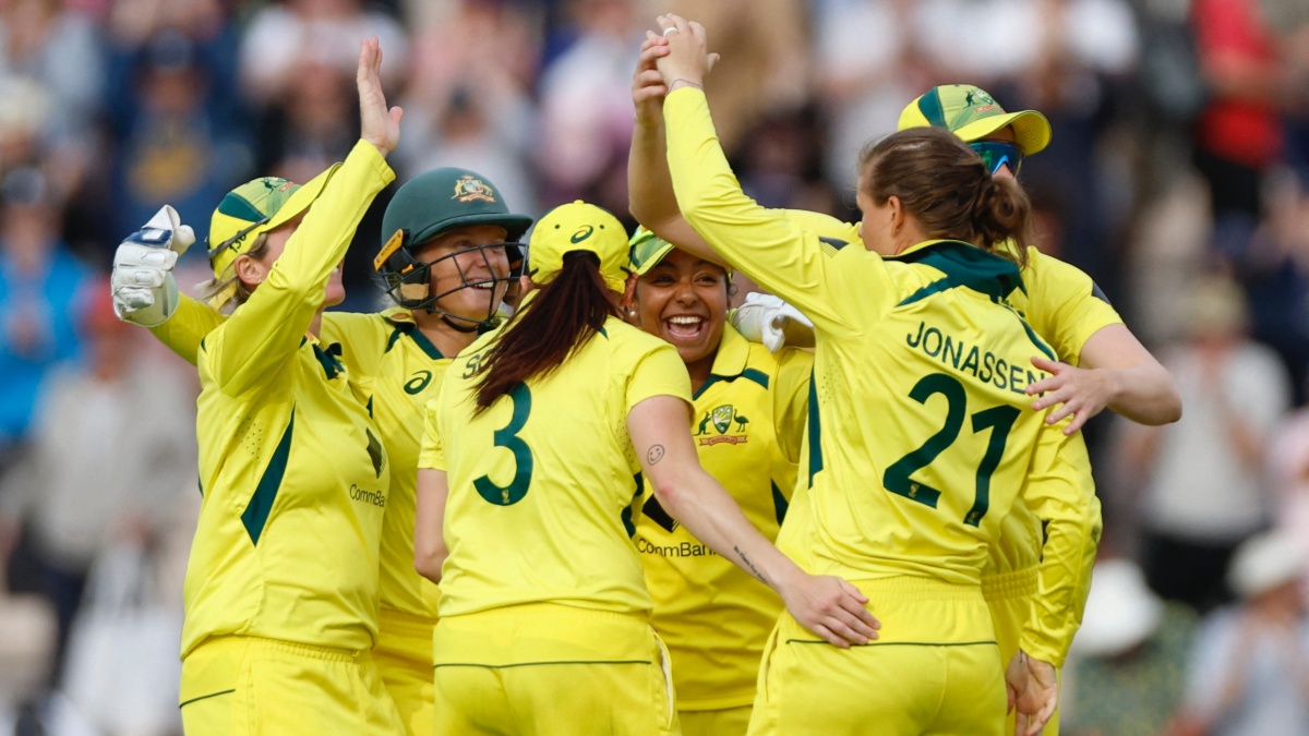 Australian team celebrating together on field